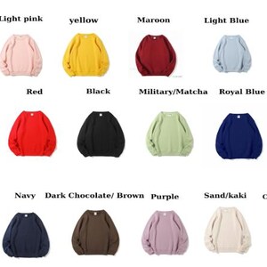 May include: A collection of crewneck sweatshirts in various colors, including forest green, light pink, yellow, maroon, light blue, and beige. Additional colors are sport grey, red, black, military/matcha, royal blue, and dark grey.
