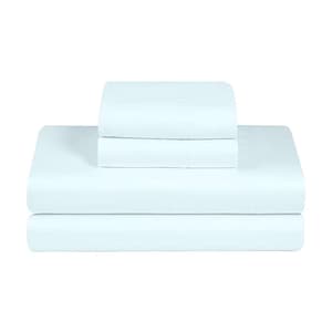 May include: A set of solid light blue bed sheets folded into a neat stack. The collection includes a flat sheet, a fitted sheet, and pillowcases, all featuring a smooth, uniform texture and a consistent pale blue color throughout the entire set.