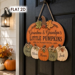 May include: A flat 2D wooden pumpkin-shaped door sign with the text Grandma & Grandpa's LITTLE PUMPKINS So Thankful For You. It features five smaller hanging pumpkin cutouts labeled Ethan, Olivia, Mason, Lily, and Jack, decorated with leaves.