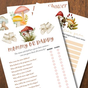 May include: Set of five printable baby shower games. The games feature watercolor illustrations of mushrooms and baby booties. One game is titled "Mommy or Daddy" and asks questions about the parents. Another game is a fill-in-the-blank game.