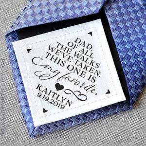 May include: White fabric tag with black text that reads "Dad, of all the walks we've taken, this one is my favorite."  The tag also includes the text "Kaitlyn 9.19.2019" and a small heart.