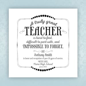 May include: A black and white framed print with the text "A truly great TEACHER is hard to find, difficult to part with, and IMPOSSIBLE TO FORGET." Includes a name, school, and date.