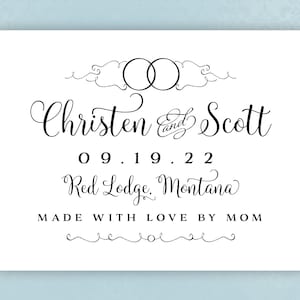 May include: Wedding announcement card with the names Christen and Scott, the date 09.19.22, and the location Red Lodge, Montana. The card also includes the text "Made with love by Mom".