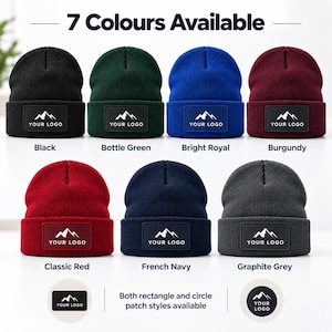 May include: Seven cuffed beanies in black, bottle green, bright royal, burgundy, classic red, french navy, and graphite grey. Each beanie features a rectangular patch with a mountain graphic and the text YOUR LOGO. Both rectangle and circle patch styles are available.