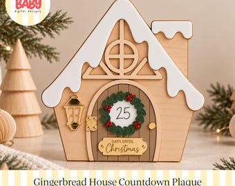 Könnte beinhalten: Ein hölzernes Lebkuchenhaus-Countdown-Schild mit weißem Dach, einer braunen Tür mit grünem Kranz, der Zahl 25 und einem goldenen Schild mit der Aufschrift Days Until Christmas. Das Haus hat eine goldene Laterne und einen Schornstein.