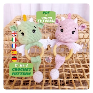 May include: Two crochet dragon baby rattles, one green and one pink, with wooden rings and white wings. The rattles have the text "PDF + VIDEO TUTORIAL" and "2-in-1 CROCHET PATTERN". The rattles are on a woven basket.