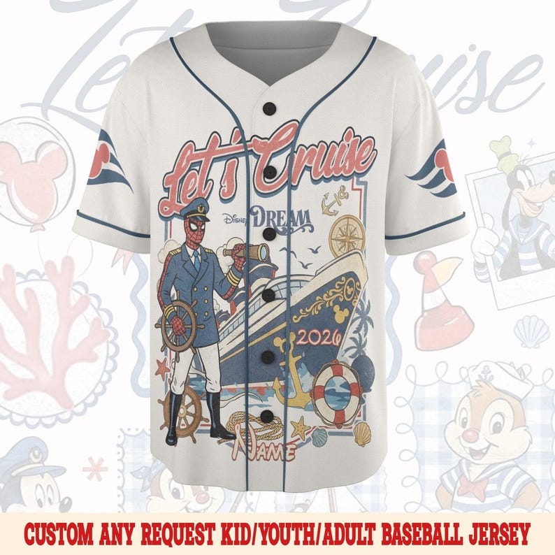 May include: White baseball jersey with navy blue trim and black buttons. The front features a cruise ship graphic with the text "Let's Cruise" and "Disney DREAM 2026". The jersey also has a Spider-Man character illustration.