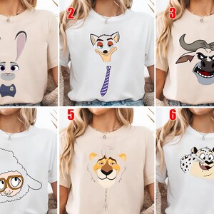 May include: A collection of six t-shirts featuring cartoon animal characters. The designs include a rabbit, a fox with a purple tie, a buffalo, a sheep with glasses, a lion, and a leopard. The shirts are in various colors.