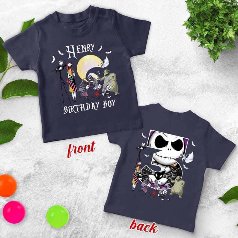 May include: Navy blue t-shirts with a graphic design featuring characters from "The Nightmare Before Christmas." The front of the shirt says "Henry Birthday Boy." The back of the shirt has a large number 5 with Jack Skellington's face.