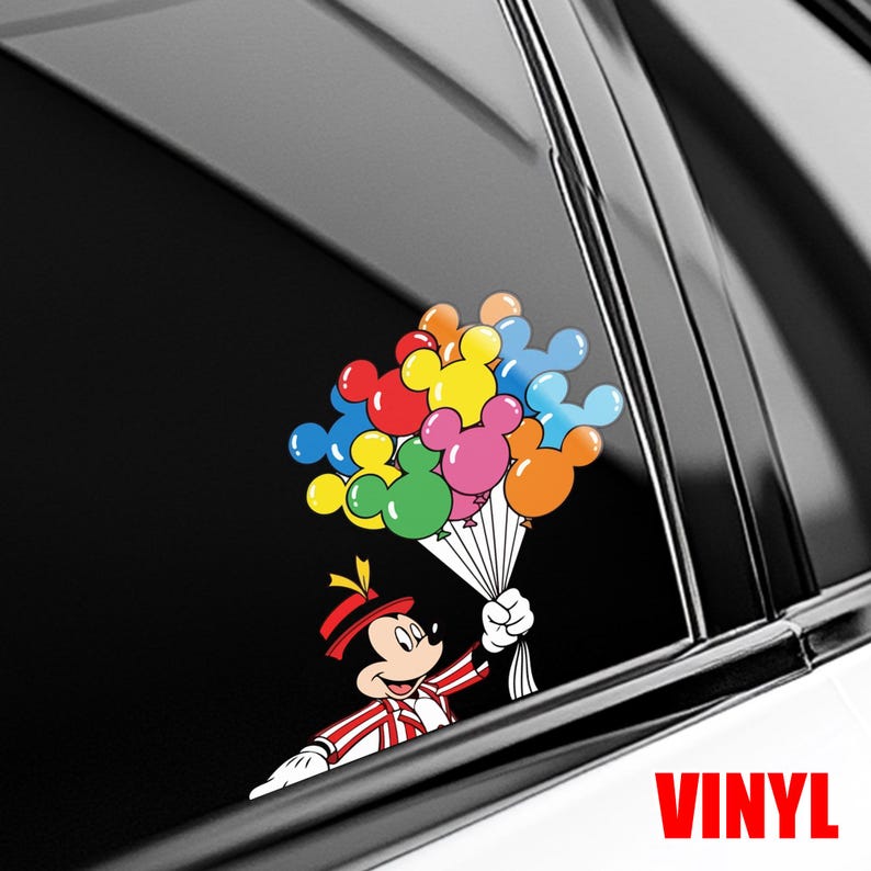 May include: A colorful vinyl decal featuring a cartoon character holding a bouquet of Mickey Mouse-shaped balloons. The balloons are in various colors, including red, yellow, blue, green, pink, and orange. The word "VINYL" is printed in red.