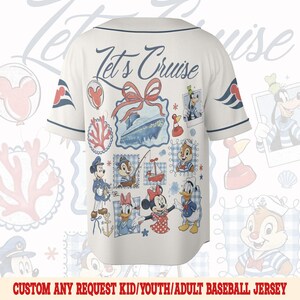 May include: White baseball jersey with blue trim and the text "Let's Cruise." The jersey features nautical-themed illustrations of Disney characters, including Mickey Mouse, Minnie Mouse, and Donald Duck. The jersey is decorated with a cruise ship and other maritime elements.