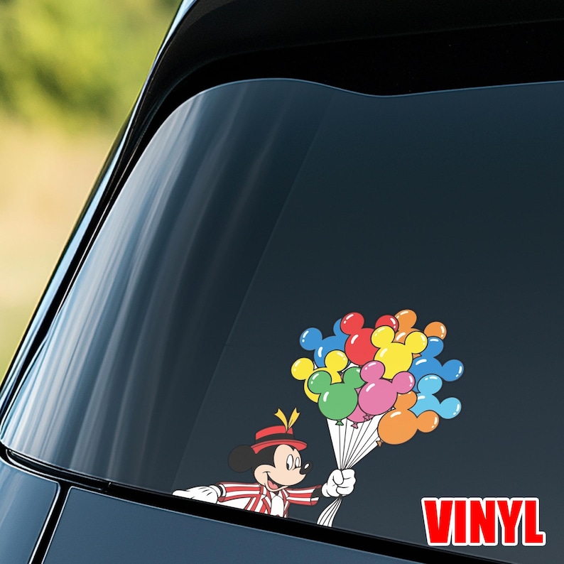 May include: A colorful vinyl decal featuring Mickey Mouse holding a bouquet of Mickey Mouse-shaped balloons. The balloons are in various colors, including red, blue, yellow, green, pink, and orange. The word "VINYL" is in red block letters.