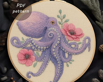 May include: A cross-stitch embroidery of a purple octopus with pink flowers and green leaves, set in a wooden embroidery hoop. The text "PDF pattern" is visible in the upper left corner.
