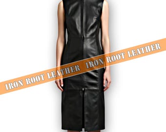 May include: Sleeveless black leather dress with a high neckline and a full-length zipper down the front. The dress has a knee-length slit in the front. The text "IRON ROOT LEATHER" is printed across the image.