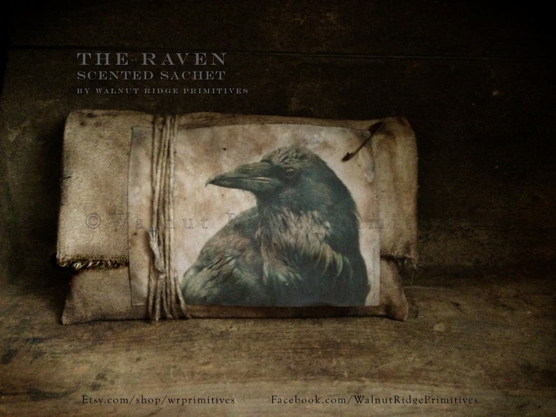 May include: A brown fabric sachet with a black raven illustration and the text "THE RAVEN SCENTED SACHET BY WALNUT RIDGE PRIMITIVES".