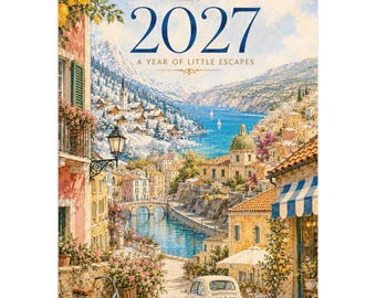 May include: A 2027 wall calendar titled A YEAR OF LITTLE ESCAPES featuring a painted illustration of a coastal European town with a blue bay, snow-capped mountains, a light blue bicycle, and a cream-colored vintage car on a cobblestone street.
