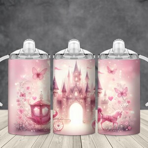 May include: Three pink sippy cups with white handles and lids. Each cup features a fairytale design with a pink castle, carriage, butterflies, and a unicorn. The cups are decorated with hearts and floral accents.