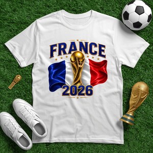 Celebrate the excitement of the upcoming 2026 FIFA World Cup with this eye-catching France 2026 Soccer Shirt! Perfect for passionate football fans, this French Football Fan Graphic Tee combines retro style with modern team spirit. Whether you’re cheering from the stands, hosting a watch party, or simply showing your love for international soccer, this vibrant shirt is a must-have addition to your game day wardrobe.