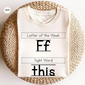 May include: A set of three ceramic mugs with a speckled, matte finish. Each mug features a different color: light blue, cream, and gray. The mugs have a simple, modern design and a comfortable handle.