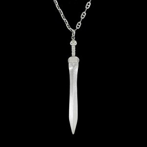 May include: A silver sword pendant necklace with a chain.