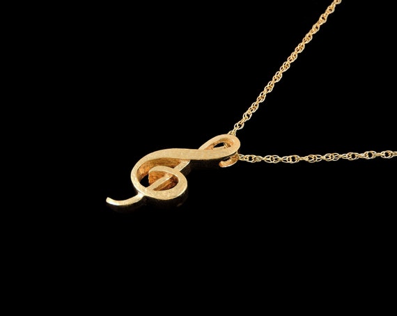 Golden clef 14k necklace deals