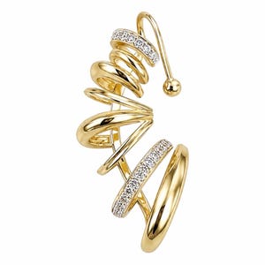 May include: A gold-toned ear cuff featuring a spiraling, multi-layered design. The structure consists of smooth, polished gold bands interspersed with two segments encrusted with small, clear, sparkling stones. The piece ends in a small ball.