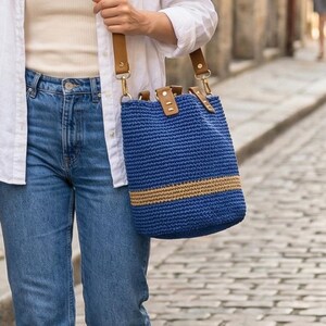 Handmade Woven Crochet Bucket Shoulder Bag with Leather Straps for Spring Summer 2026 Trends