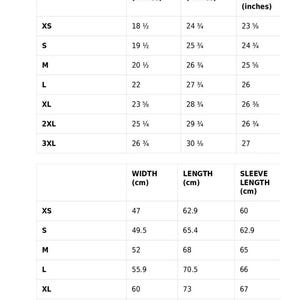 May include: Size guide for a garment with measurements in inches and centimeters. The table shows the width, length, and sleeve length for sizes XS to 3XL.