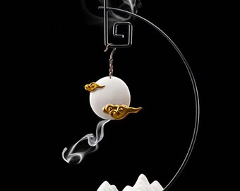 Wiszący kadzielnik: Niebiańskie wzory księżyca i chmur, podstawa ceramiczna