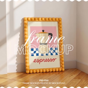 May include: A framed art print featuring a retro espresso maker illustration. The frame is a light orange color with a bubble-like design. The print has the word "espresso" in red script.