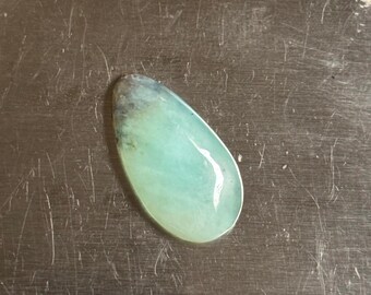 Peruvian Opal Cabochon 23.7 X 13 X 4.3 mm.