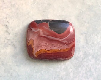 Imagem Cabochão Riolito 27x22x4 mm.
