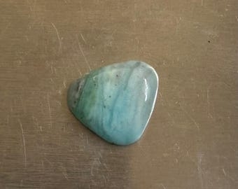 Peruvian Opal Cabochon 15.6 X 18 X 5 mm.