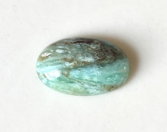 Peruvian Opal Cabochon 24.7 X 16 X 7.8 mm.
