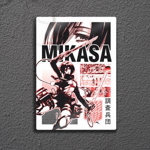 May include: A red and black graphic art print featuring a character from the anime series, Attack on Titan. The print displays the name "MIKASA" in bold letters, along with Japanese text and an illustration of the character holding swords.