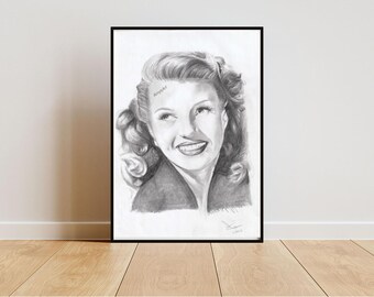 May include: Pencil portrait of a smiling woman with curly hair, framed in black. The artwork is a detailed sketch, capturing the subject's expression and features. The portrait is displayed on a white wall above a wooden floor.