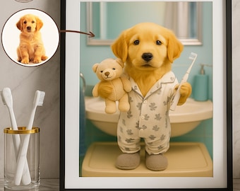 May include: A framed print featuring a golden retriever puppy dressed in pajamas, holding a teddy bear and a toothbrush. The puppy is standing in a bathroom setting. The print includes a smaller inset image of the puppy. The frame is black.