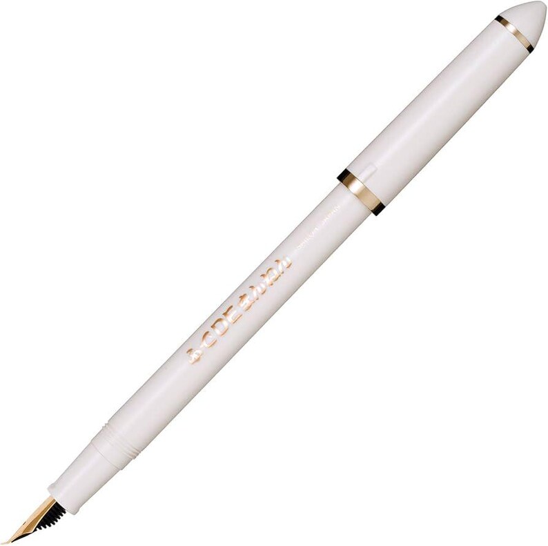White pen with gold accents on a white background