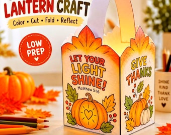 May include: A paper lantern craft featuring fall-themed illustrations of pumpkins and leaves. The text reads "CHRISTIAN FALL LANTERN CRAFT", "LET YOUR LIGHT SHINE! Matthew 5:16", and "GIVE THANKS". It includes a handle and is designed for coloring.