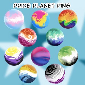 May include: A collection of ten circular pins titled PRIDE PLANET PINS, each featuring a unique spherical design with swirling patterns in various color combinations including pink, blue, yellow, orange, green, purple, black, white, and grey.