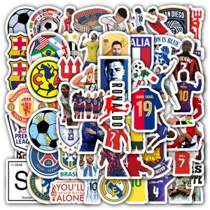 May include: A collection of soccer-themed stickers featuring team logos, player portraits, and jersey designs. Includes stickers with the text "RONALDO", "LAMINE YAMAL 19", and "YOU'LL NEVER WALK ALONE". The stickers are in various colors.