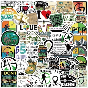 May include: A collection of geocaching-themed stickers with various designs, including maps, compasses, GPS symbols, and phrases like "Geocaching is Life" and "I'm Not Lost, I'm Caching." The stickers are in various colors.