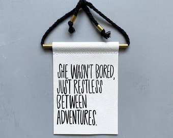 She Wasn't Bored, Just Restless Between Adventures Brass & Cord Hanging Banner - canvas banner - motivational print - inspiration