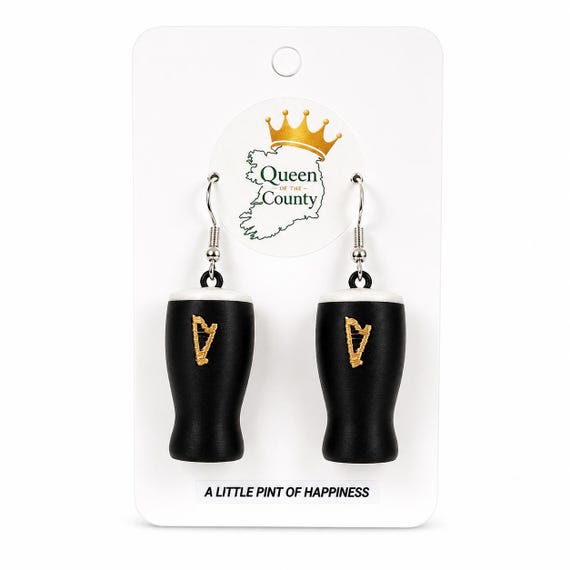 Miniature pint glass earrings shaped like actual Irish beer glasses — a genuinely cheeky, handmade novelty accessory that doubles as a conversation starter at any pub.