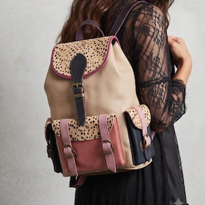 Multicoloured Patchwork Leather Backpack Purse: Cowhide Shoulder Bag with Animal Print