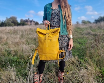 Large roll top leather backpack for women in minimalist design - practical versatile travel rucksack