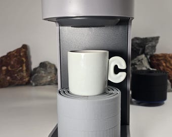 Elevate PLUS Anti-Splash Cup Stand for Keurig, Cuisinart and more, Adjustable Coffee Maker Accessory, 4 Height Settings (Gray Primary)
