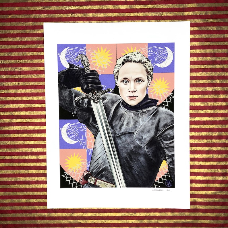 May include: A digital illustration of a woman in armor holding a sword. The background is a colorful pattern of stars, moons, and wolves. The woman has short blonde hair and is wearing a black and silver suit of armor. The sword is silver with a black hilt.