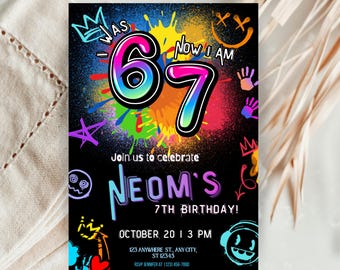 May include: A black birthday invitation with colorful graffiti-style accents. The text reads "WAS 67 NOW I AM 7" in a vibrant font. The invitation also includes details for Neom's 7th birthday, including the date, time, and location.