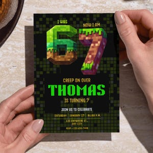 May include: A birthday invitation with a pixelated design. The invitation reads "I WAS 6, NOW I AM 7" with the name "THOMAS" in large green letters. The invitation includes the date, time, and location of the party.